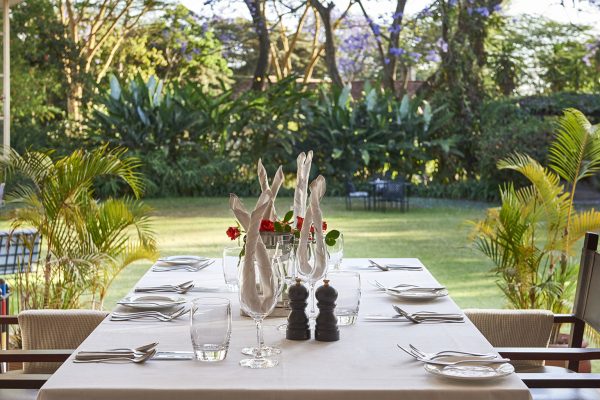 legendary-lodge-set-up-for-lunch-on-the-veranda